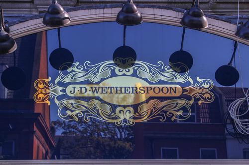 Wetherspoons warns on profits, cites higher costs